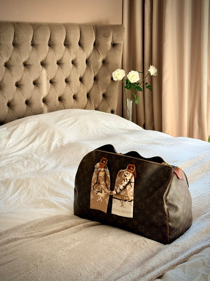 Nika Privé — Louis Vuitton Speedy 40 in Monogram Canvas, classic large travel bag
